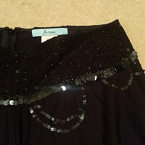Black skirt with sequin detail at top - Picture 2 of 2